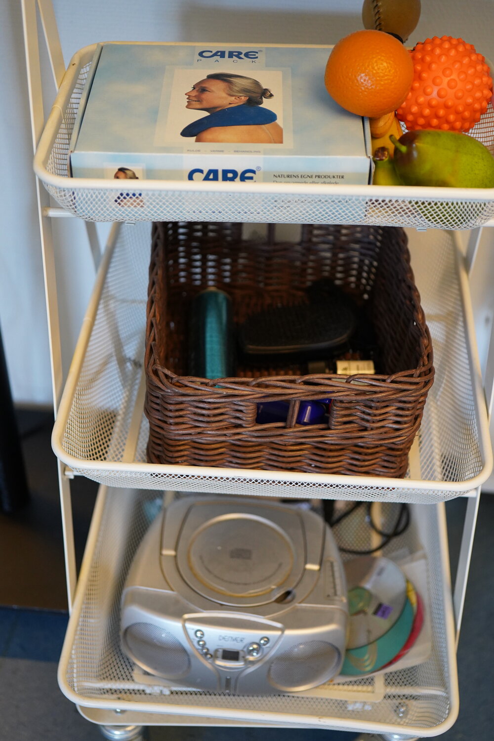 A cart in the staff room, which contains massagers, rollers, etc. for use by the residents and staff